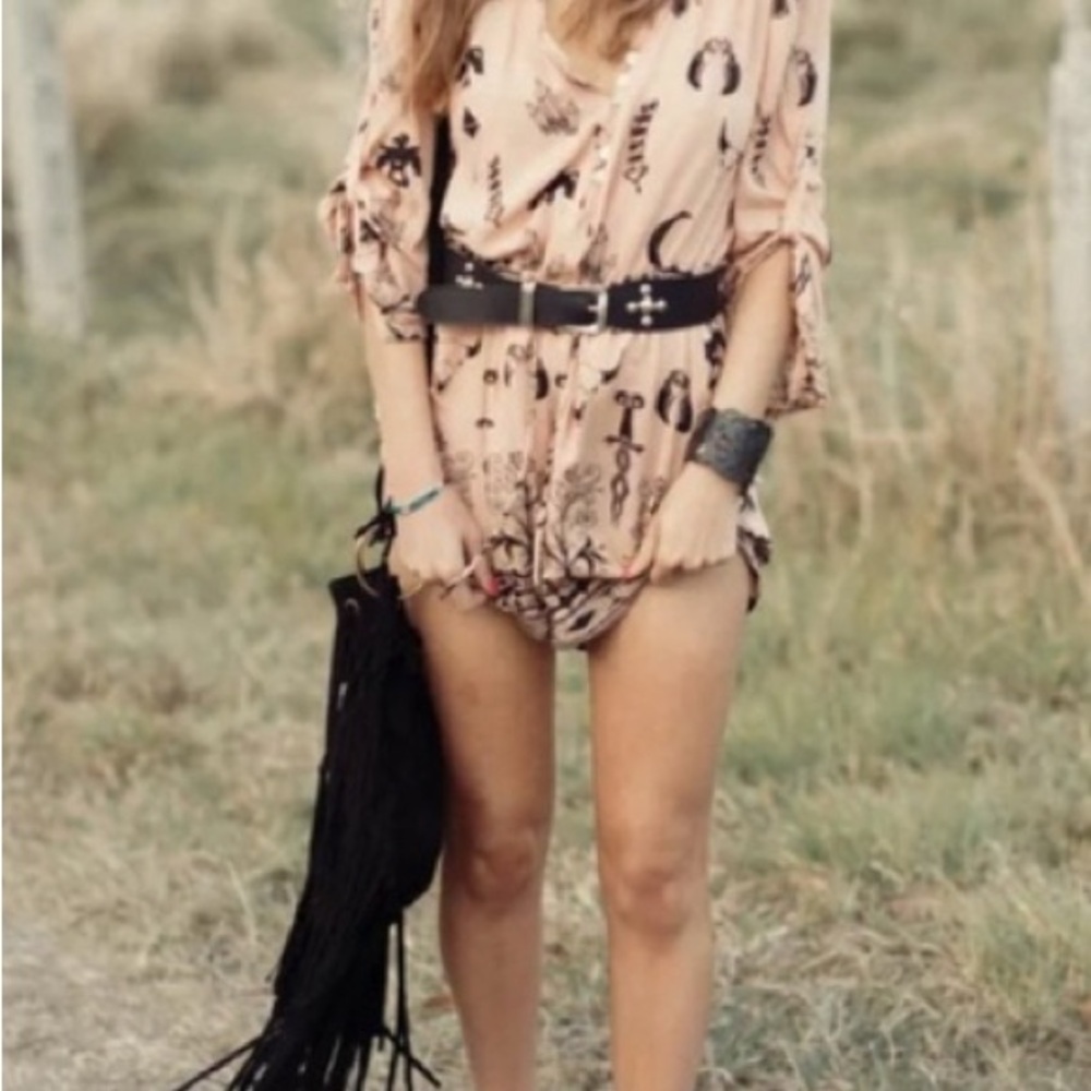 Sold Elsewhere 
“Tribal” vintage top converted from a romper - Size 6